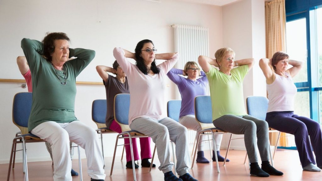 A yoga class of senior women
