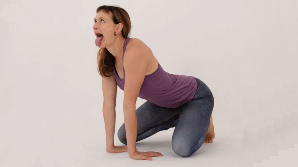 Woman doing face yoga